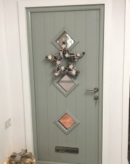 Hanging wreath on a composite door