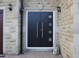 Milano composite French doors in black on cream frame with ES3 door handle and key only security locking option.