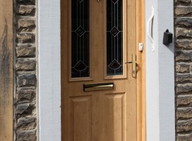 Ludlow 2 composite door and integrated top light in Irish Oak with Diamond glass.