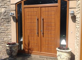 Bespoke French Windsor style composite doors in Golden Oak with 800mm handles, fitted in Selby.
