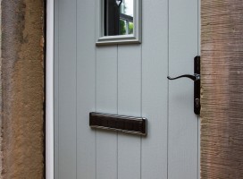 Flint 2 composite door in Painswick with white frame and catflap