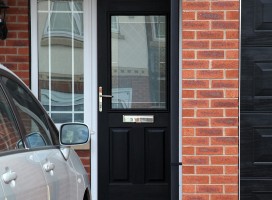 Beeston composite door in Black with White frame and integrated side light and Brilliante glass.