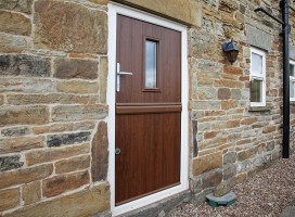 Bespoke Flint 2 composite stable door in Walnut with Cream frame installed at converted barn in Sheffield.