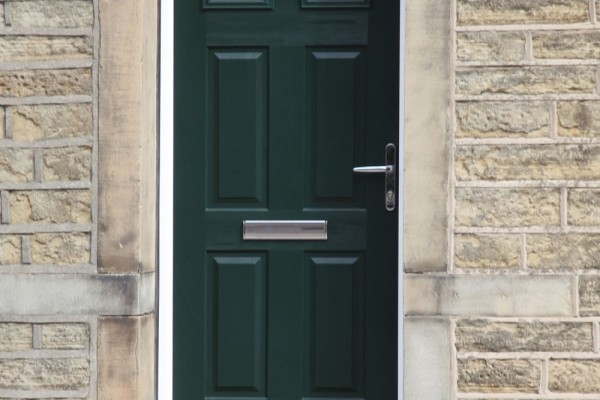 Tenby 2 composite door with top light incorporated in same frame in green with CTL 17.4 glass.